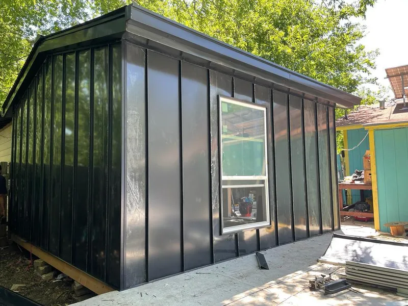 Black standing seam metal wall panels for Roof Inspection in Bernalillo