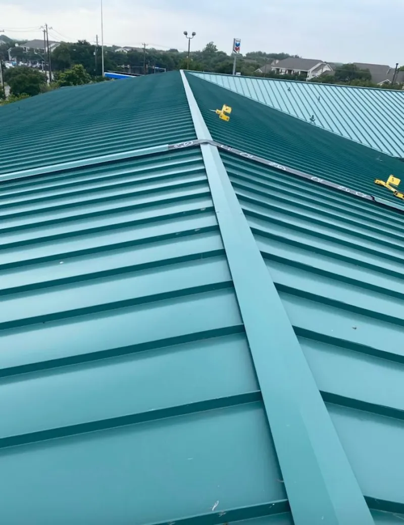 Green commercial metal roof ridge and valley for Metal Roof Repair in Bernalillo